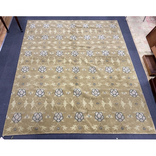 1162 - An Arts and Crafts style pale green ground carpet, 300 x 250cm