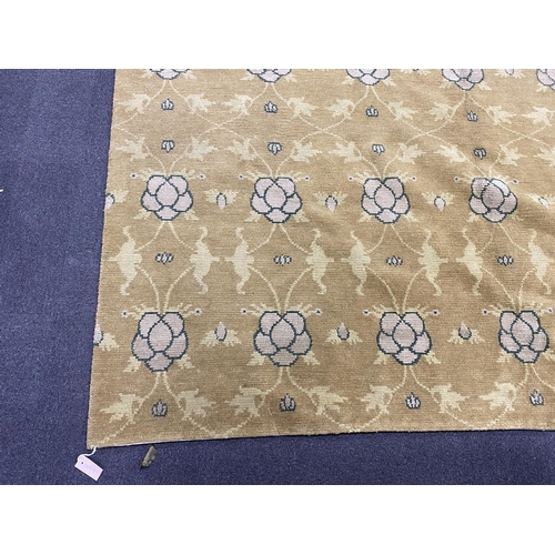 1162 - An Arts and Crafts style pale green ground carpet, 300 x 250cm