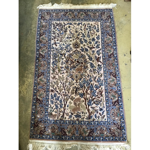 1167 - A Tabriz peach ground part silk pictorial rug, 180 x 111cm