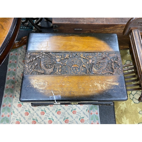 1172 - A Chinese carved camphorwood work box, width 60cm, depth 46cm, height 67cm