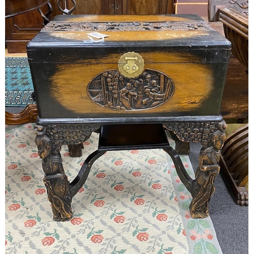 1172 - A Chinese carved camphorwood work box, width 60cm, depth 46cm, height 67cm