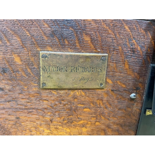 1180 - A Victorian iron bound oak silver chest, bears engraved brass plaque, Major Richards 55  Regt, wid... 