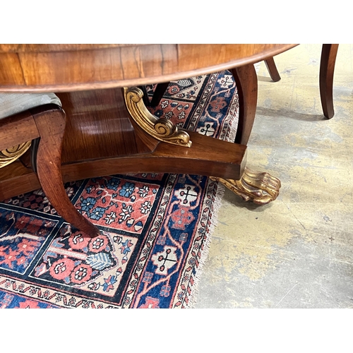 1181 - A Regency and later circular parcel gilt rosewood breakfast table (no bolts), diameter 122cm, height... 