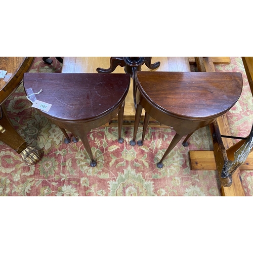 1187 - A pair of small George II style red walnut D shaped folding tea tables, width 45cm, depth 22cm, heig... 