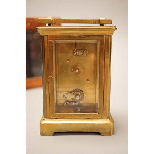 1251 - A leather cased brass carriage timepiece, retailed by Bracher & Sydenham