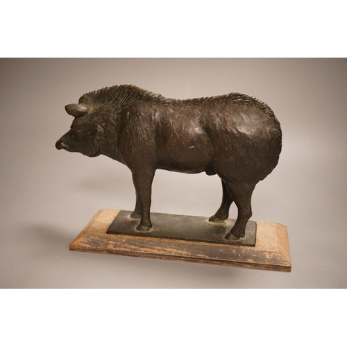 1256 - A 20th century bronze model of a standing boar, on inset wooden base, height 17cm, length of boar 26... 