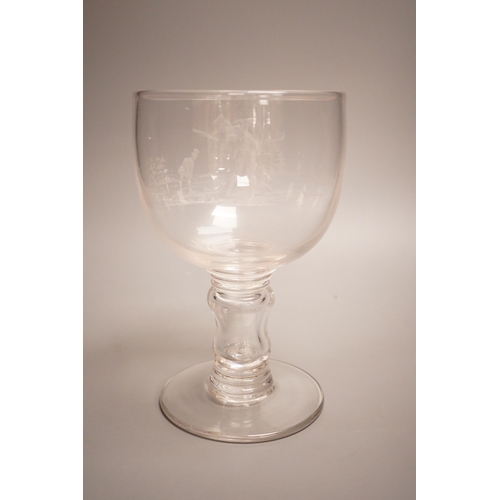 1257 - Golfing interest - a Victorian wheel engraved glass goblet, depicting two golfers, height 23cm... 