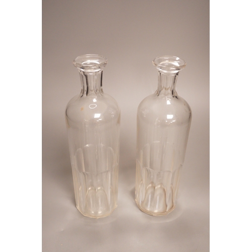 1261 - A pair of Baccarat for Hermes glass decanters, 29cm