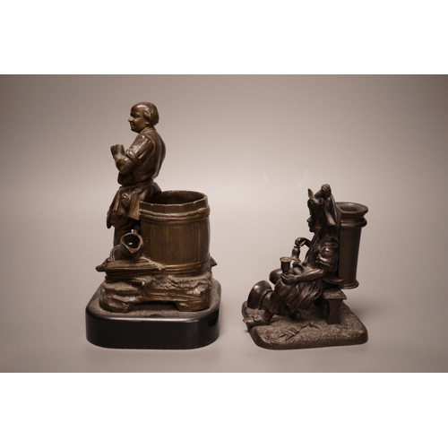 1265 - Two late 19th century bronze spill vases, cast as a tradesman and a war veteran. Tallest 19cm