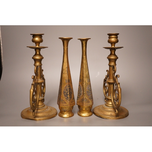 1266 - A pair of Victorian brass candlesticks and a pair of Arabic brass posy vases, tallest 25cm