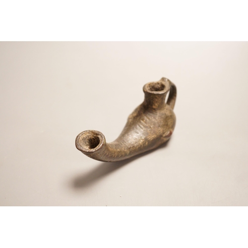 1277 - An early bronze oil lamp, probably Byzantine, 16cm long