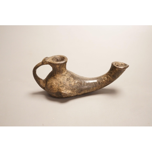 1277 - An early bronze oil lamp, probably Byzantine, 16cm long