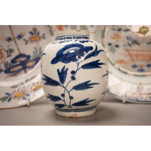 1289 - Two 18th century English delftware plates and a 18th century Delft vase, plate diameter 23cm (3)... 