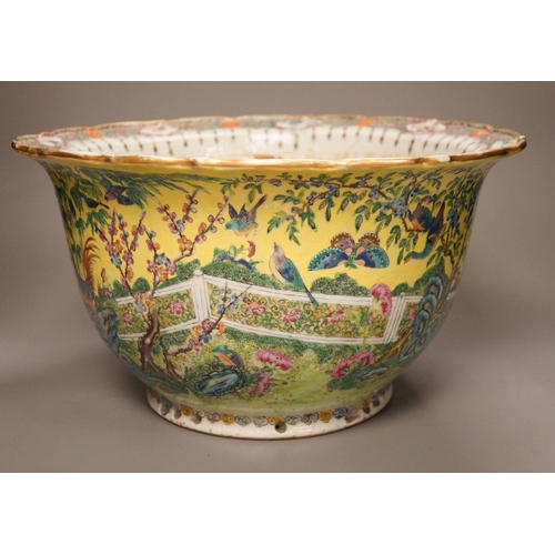 1307 - An early 20th century Chinese famille rose yellow ground jardiniere, a.f, 37cm