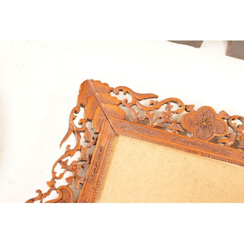 1309 - A Chinese carved sandalwood picture frame, 36x41 cm total