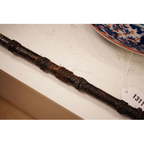 1314 - A ceremonial sword stick with removable brush end,