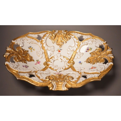 1329 - An early 20th century Meissen two handled white and gilt floral oval dish, 32cm