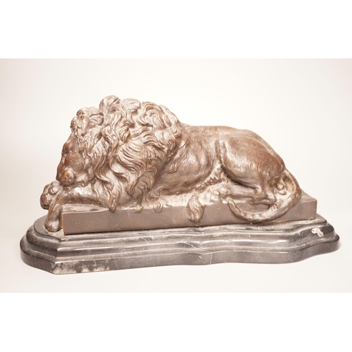 1332 - After Isadore Bonheur a bronze figure of a recumbent lion, on marble base, 20th century, 35cm