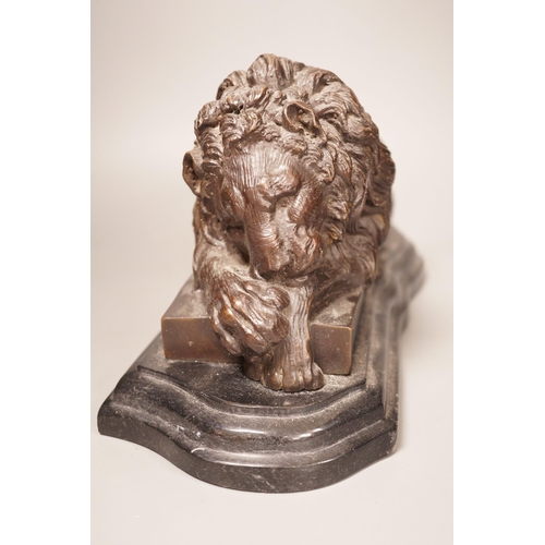 1332 - After Isadore Bonheur a bronze figure of a recumbent lion, on marble base, 20th century, 35cm