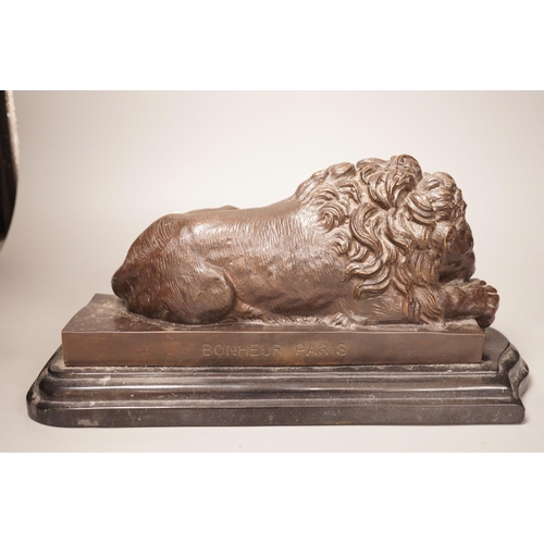 1332 - After Isadore Bonheur a bronze figure of a recumbent lion, on marble base, 20th century, 35cm