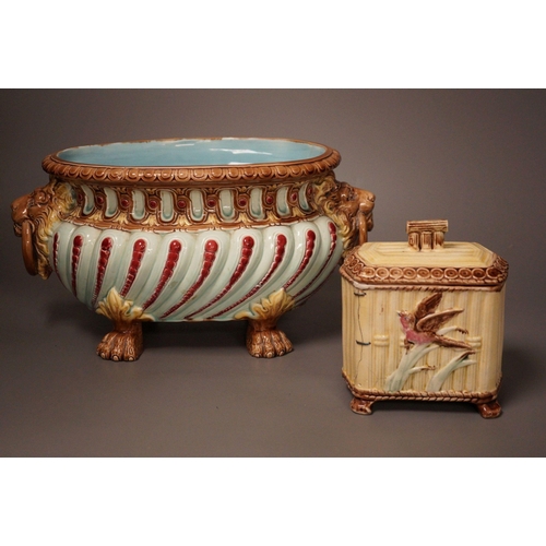 1333 - A Continental majolica tureen and a tea caddy, largest 32cm