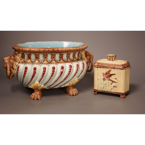 1333 - A Continental majolica tureen and a tea caddy, largest 32cm