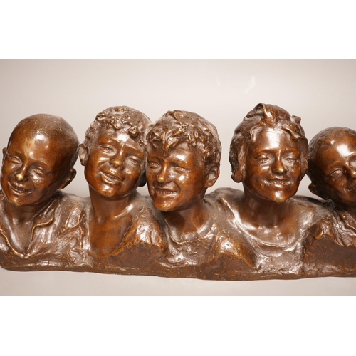 1340 - Vincenzo Aurisicchio, (Napoli 1855-1926) a bronze bust group of five smiling children, signed to rev... 