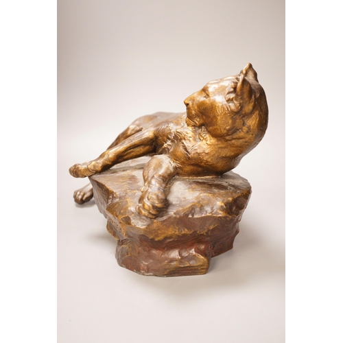 1345 - After Charles Valton, a gilt bronze study of a recumbent lioness, 39cm