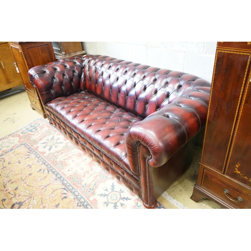 1 - A Victorian style buttoned burgundy leather Chesterfield settee, length 200cm, width 90cm, height 74... 