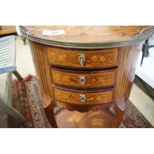 113 - An early 20th century French marquetry oval three drawer small chest, width 50cm, depth 36cm, height... 