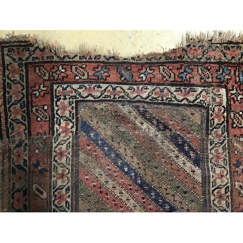 114 - An antique Gendje runner, 370 x 100cm