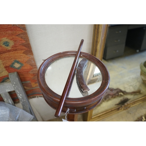 125 - A Victorian mahogany shaving stand in need of restoration