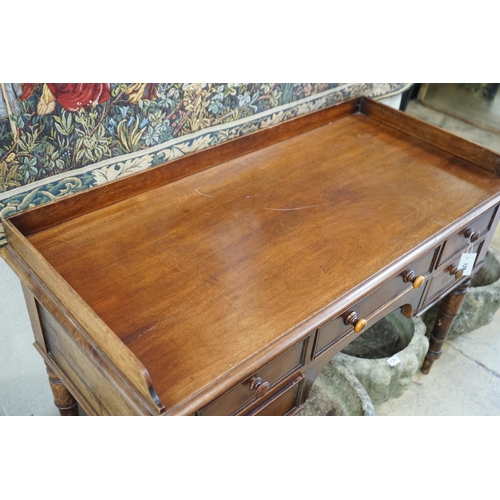 129 - A Victorian mahogany kneehole dressing table, width 112cm, depth 52cm, height 79cm