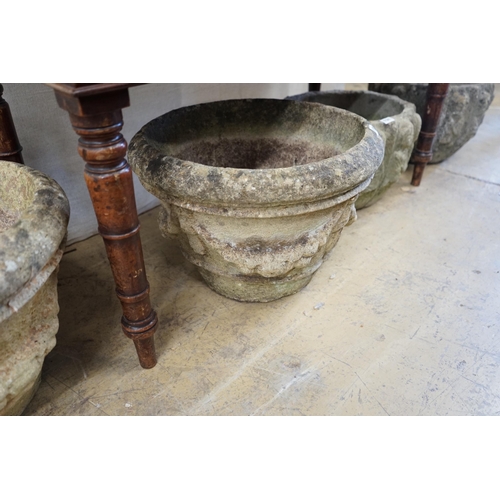 130 - A pair of circular reconstituted stone garden urns with swagged floral bodies diameter 46cm height 3... 