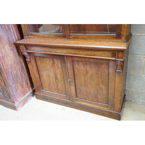 133 - A late Victorian mahogany bookcase, length 122cm, depth 41cm, height 218cm