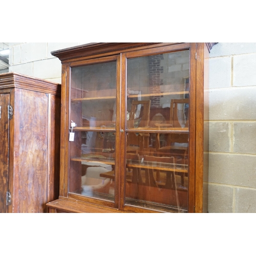 133 - A late Victorian mahogany bookcase, length 122cm, depth 41cm, height 218cm