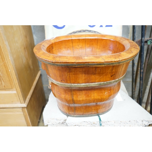 14 - A Chinese staved wood baby's bath, length 53cm, depth 40cm, height 41cm