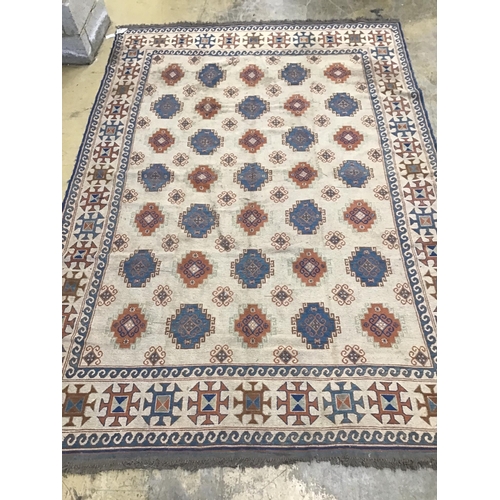 15 - A Soumak ivory ground carpet, 329 x 227cm