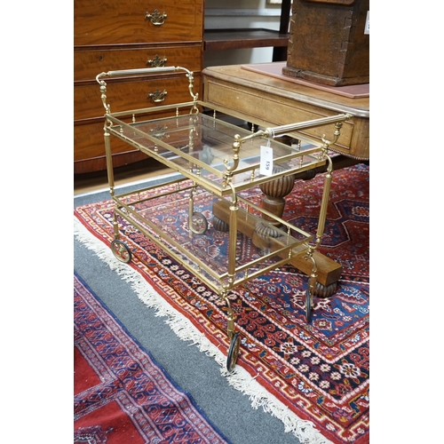 159 - A brass and glass two tier tea trolley, width 84cm, depth 42cm, height 73cm