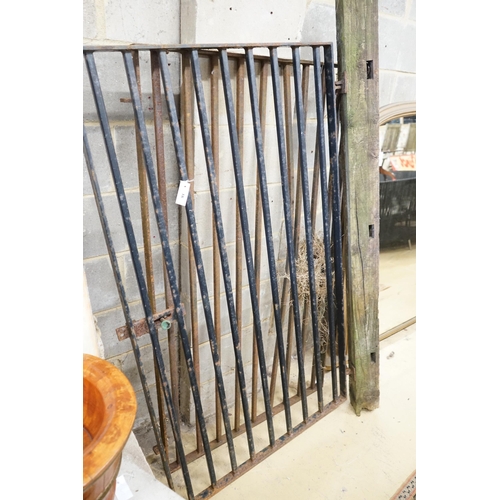 16 - A pair of small wrought iron gates, each width 93cm, height 160cm