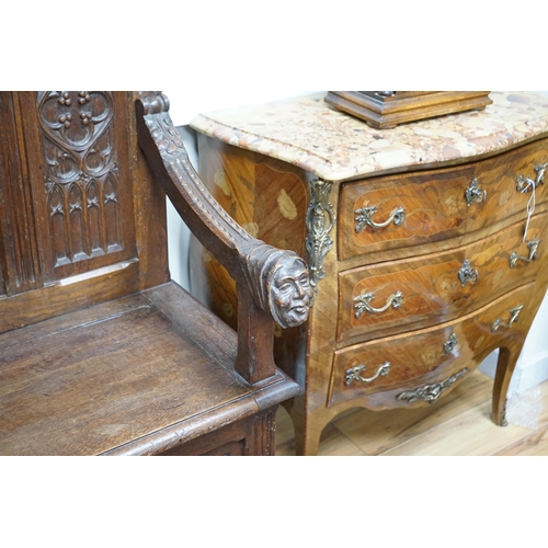 169 - An early 20th century Gothic style carved oak box seat settle, length 116cm, depth 45cm, height 154c... 