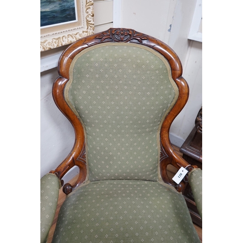 170 - A Victorian walnut spoon back open armchair