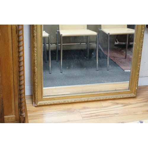 180 - A 19th century French giltwood and gesso overmantel mirror, width 98cm, height 183cm