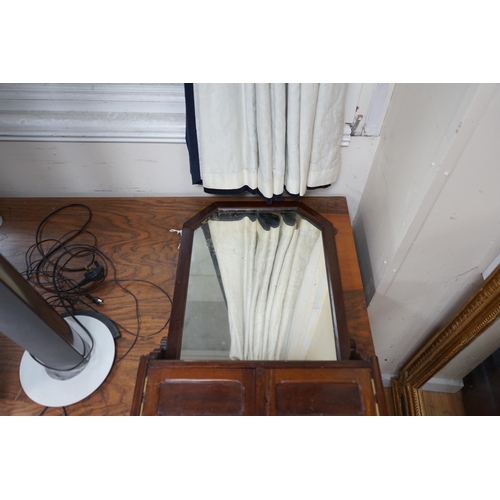 188 - A 19th century German carved oak and beech spinning chair and an Edwardian wall mirror with hanging ... 