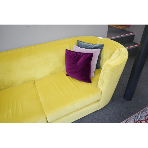 193 - A contemporary Conran tub framed settee, upholstered in Italian Wattle velvet, with up to date fire ... 