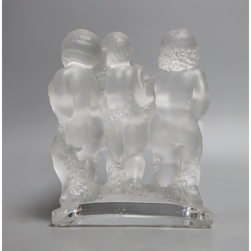 258 - A Lalique glass trio of putti, 20cm