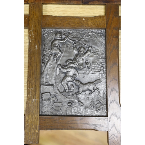 284 - Three assorted cast metal panels together with a carved walnut panel, 39x40cm