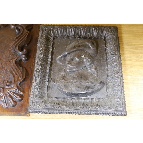 284 - Three assorted cast metal panels together with a carved walnut panel, 39x40cm