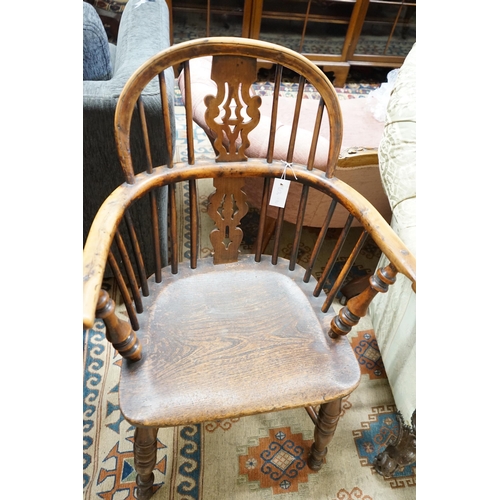 41 - A mid 19th century Yorkshire area Windsor yew and elm elbow chair with crinoline stretcher, width 59... 