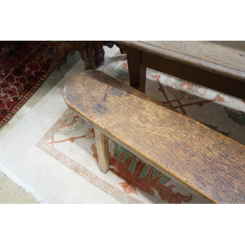 51 - A pair of 19th century provincial elm and beech bench seats, length 199cm, depth 23cm, height 48cm... 